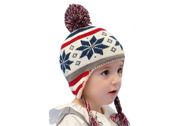 Gorro navideño infantil con pompón de copos de nieve - 11193674