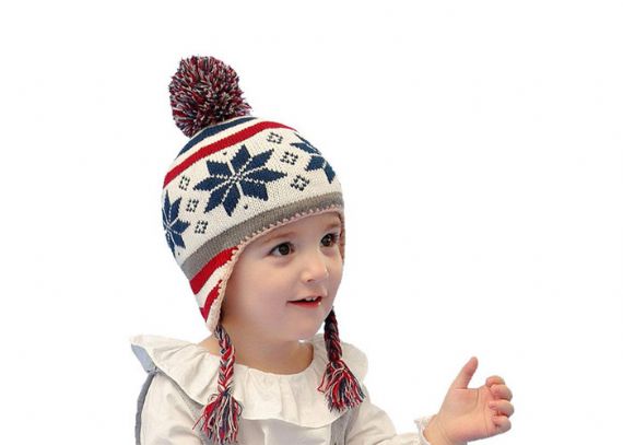 Gorro navideño infantil con pompón de copos de nieve - 11193674